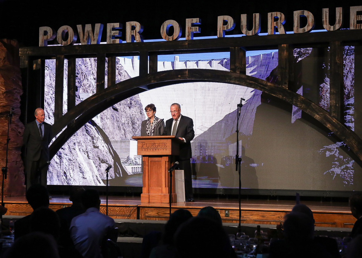 Schweitzers Accept Purdue University 2018 Distinguished Pinnacle Award